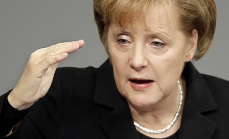 Merkel aims to turn tide with fiery speech