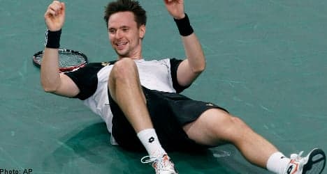 Söderling wins first Masters title over Monfils