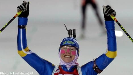 Sweden's Ekholm claims world biathlon gold