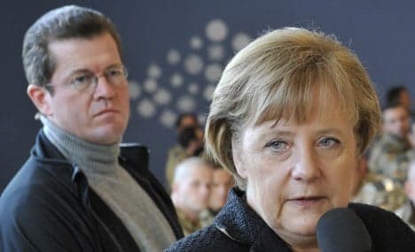 'Explain plagiarism,' Merkel asks Guttenberg