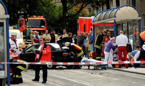 Car ploughs into crowd injuring 11 people