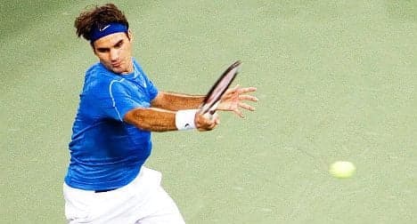 Rusty Federer fights past 'great' Nieminen