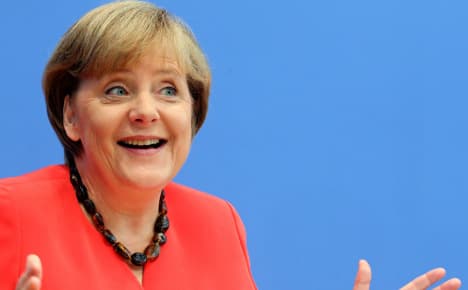 Merkel helps boost conservatives' popularity