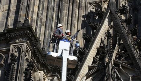 Crumbling Cologne cathedral drops stones