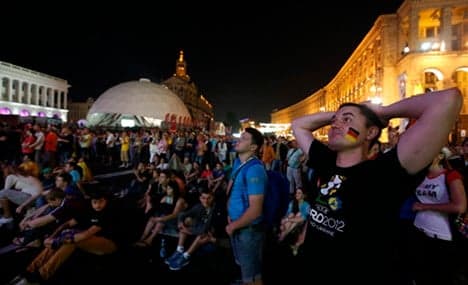 Germany fined for firework-flinging fans