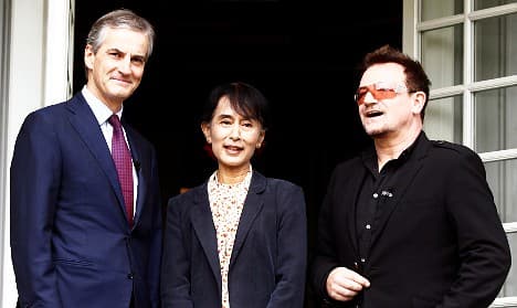 Gratitude and laughs as Suu Kyi meets Bono