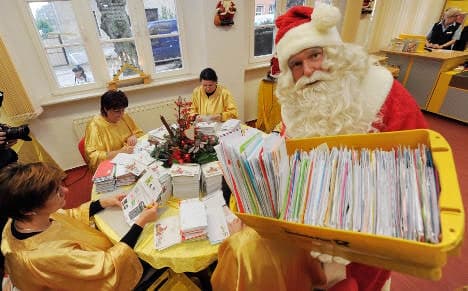 Santa's helpers await Christmas wish lists