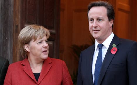Merkel visits Cameron for EU talks