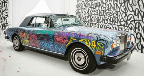 Cantona's Rolls Royce raises €125,000