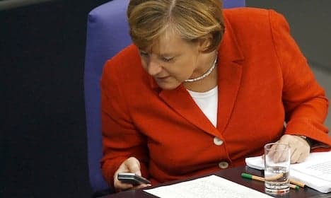 Top texter Merkel not aflutter about Twitter