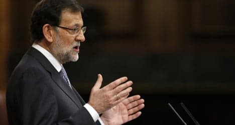 Spain revises up 2012 deficit figure