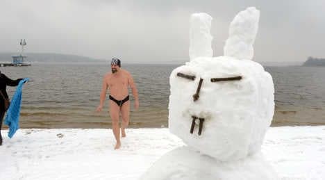 Hardy Germans brave snow to take a dip