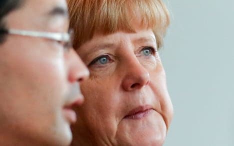 Merkel's coalition hits winning poll position