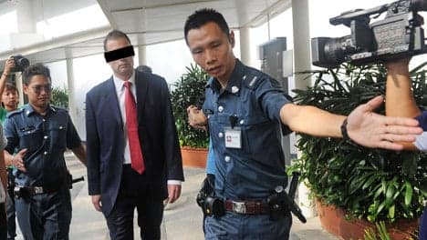 Ex-banker convicted on sex charge in Singapore