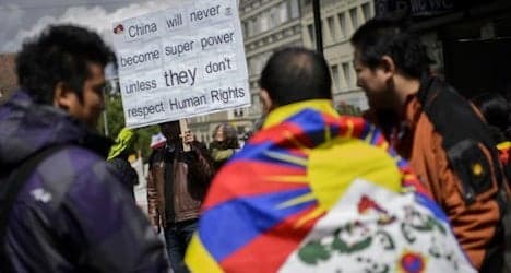 Tibetan exiles berate Chinese rights record