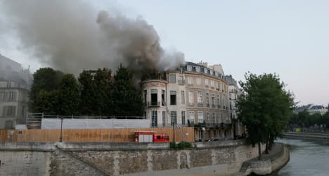 Qatar 'vows to' restore fire-hit Paris landmark