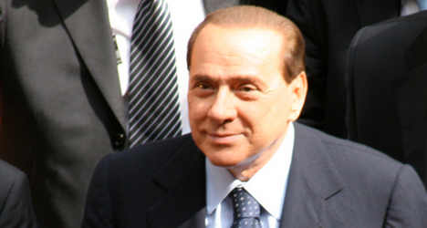Jail term for Berlusconi as PM calls for calm