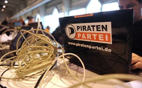 Pirates crash protest drone at Merkel rally