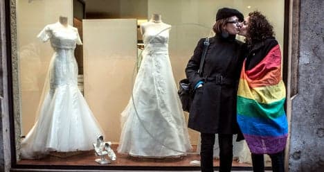 Italy's gay union ban allows Russian adoption