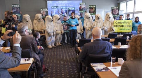 Greenpeace 'polar bears' break up oil conference