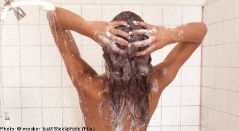 Police employee 'secretly filmed women in shower'