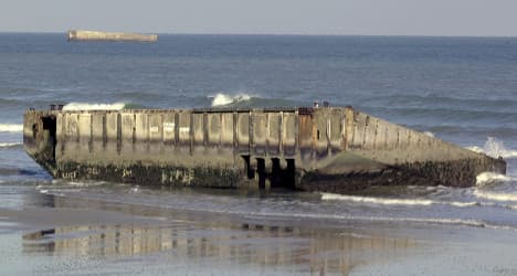 Remnants of D-Day harbour wear away at sea
