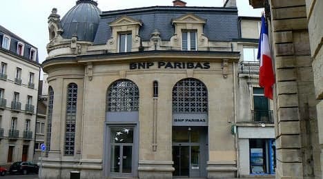 French bank to cut jobs in Ukraine over crisis