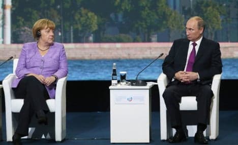 Merkel warns Russia of 'massive' damage