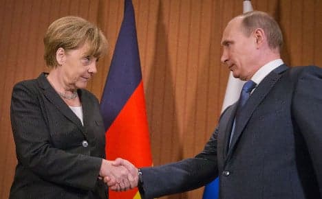Merkel and Putin talk Ukraine in Normandy