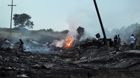 France demands probe into Malaysian jet crash