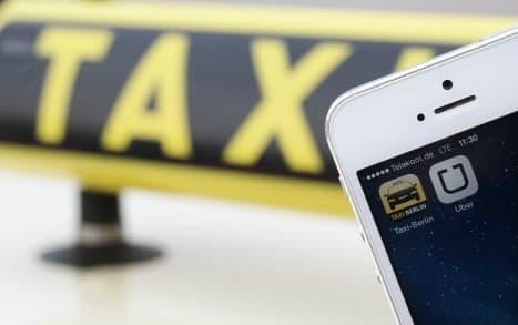 Berlin bans Uber app, taxis rejoice
