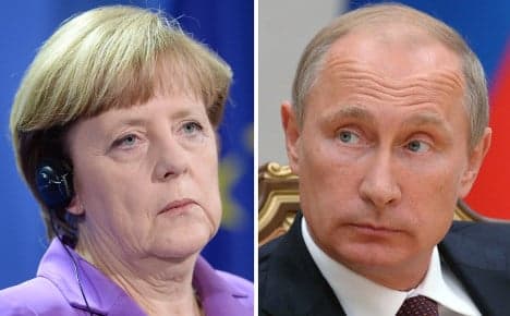 World welcomes Merkel's face-off with Putin