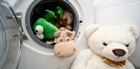 Firefighters free child from washing machine