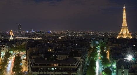 Drones fly over Paris landmarks during night