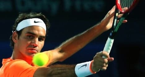 Federer eases through to Dubai Open semifinals