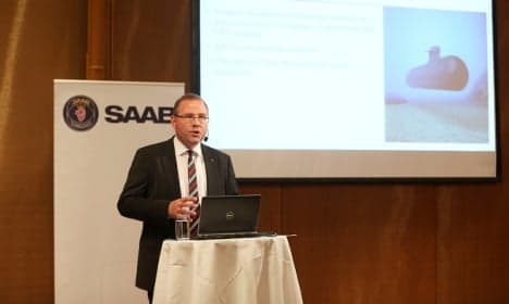 Defence giant Saab sees surprise fall in profits