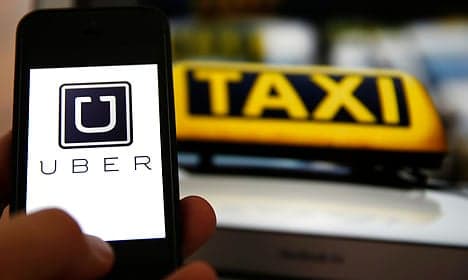 Uber charged with violating Danish law