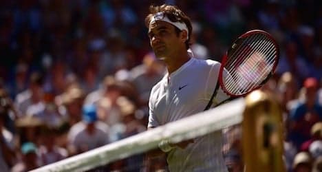 Federer and Nadal brush aside Wimbledon heat