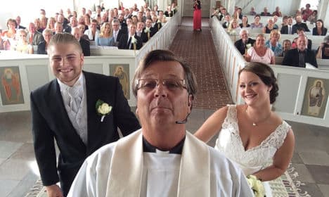 Swedish priest scores fame with wedding selfie