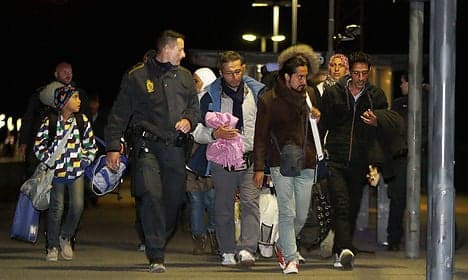 Refugees flee from police in Danish port town