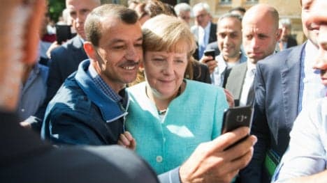 Let's get refugees working quickly: Merkel