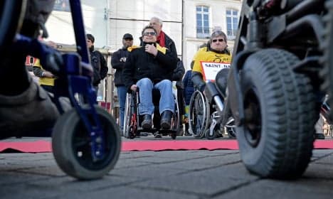 France's disabled forced into 'exile' in Belgium
