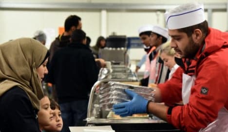 Germany's big surplus to cover costs of refugees