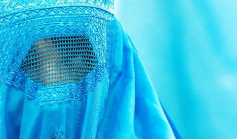 Interior minister proposes partial burqa ban