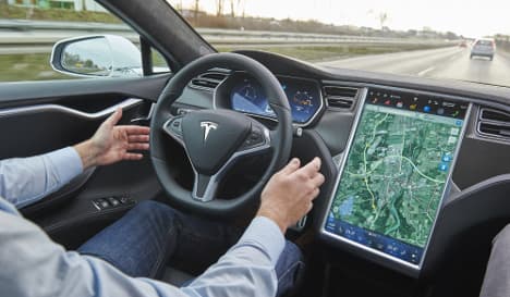 Self-driving Tesla car hits bus on Autobahn