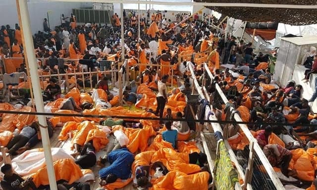 Norwegian ship rescues 2,400 migrants amid 'chaos'