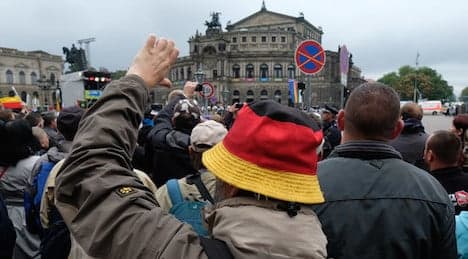 'Get out' jeering crowds tell Merkel in Dresden