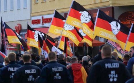 Far-right radicals try to storm east German police station