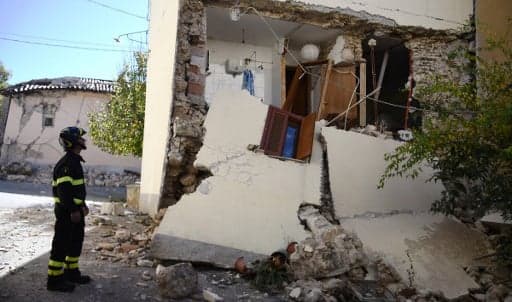 Italy's PM vows to rebuild devastated quake region