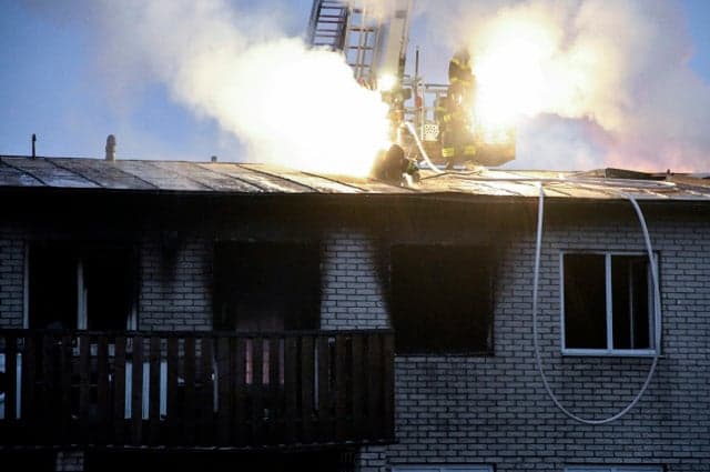 Girl jumps to escape burning building in Sweden